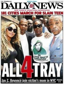 Daily News photo. Rev. Sharpton stands with Beyonce, Jay-z, and the mother of Trayvon Martin.